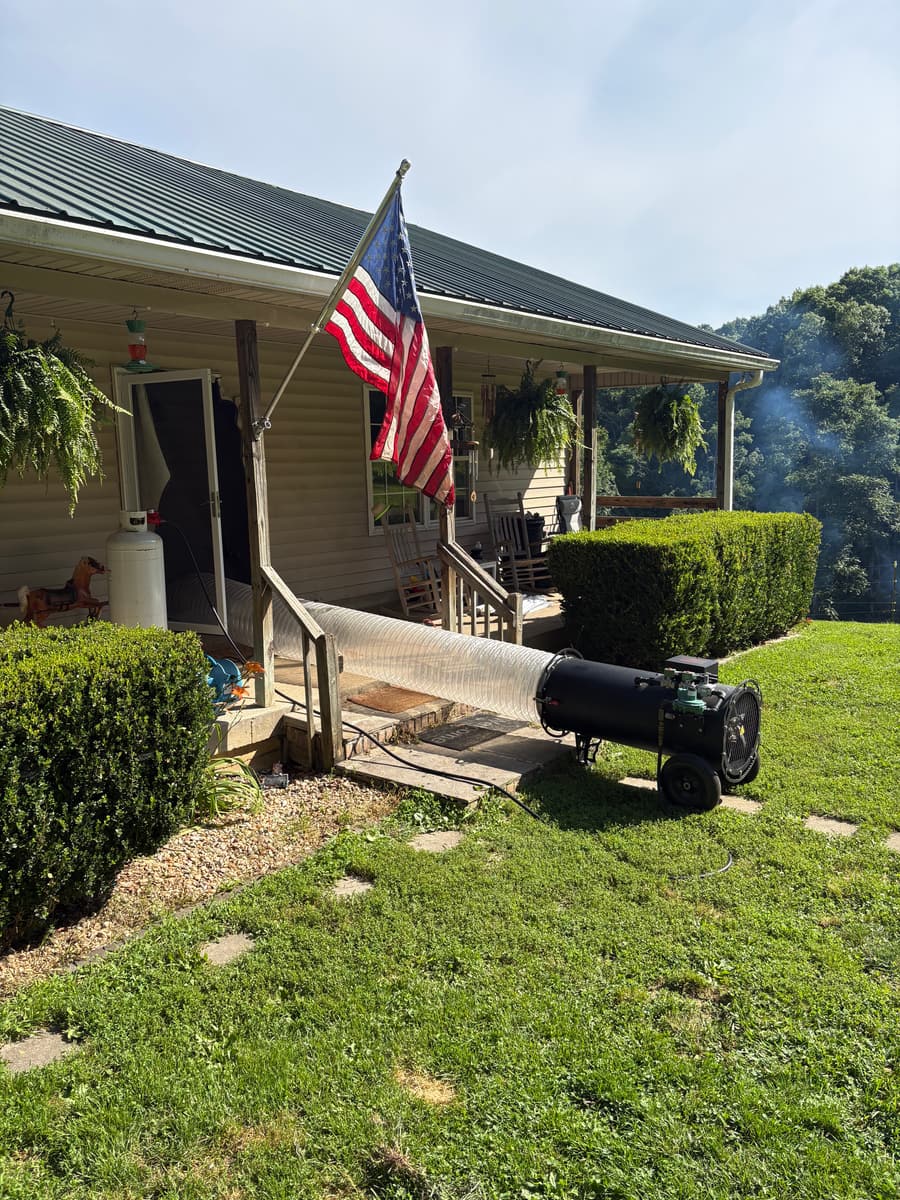 EcoForce bed bug heat treatment equipment staged outside a Tennessee home during an active field job